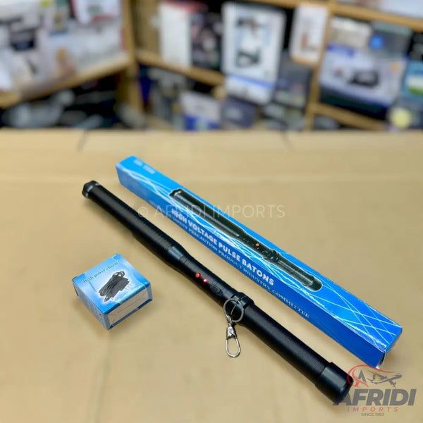Black extendable high-voltage pulse baton in its blue packaging.