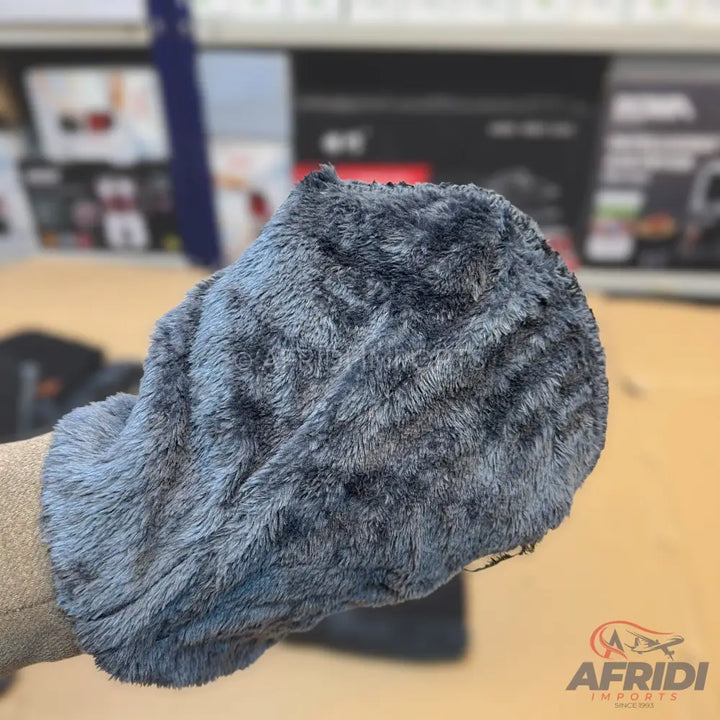 Warm, plush gray interior lining of a garment or accessory.