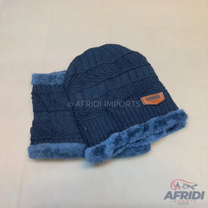 Dark blue knitted beanie and neck warmer set with a soft, fuzzy lining.