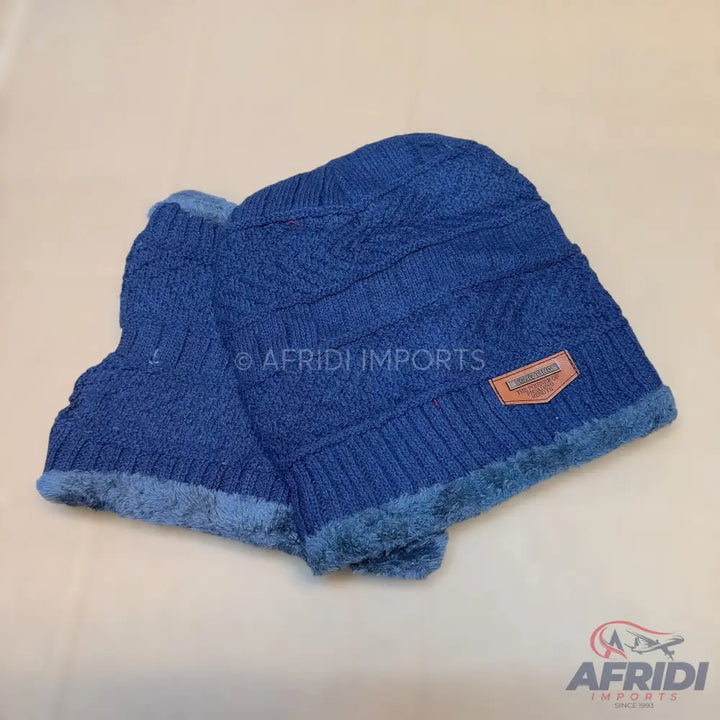 A navy blue knit beanie and matching neck warmer set with a soft, fuzzy lining.