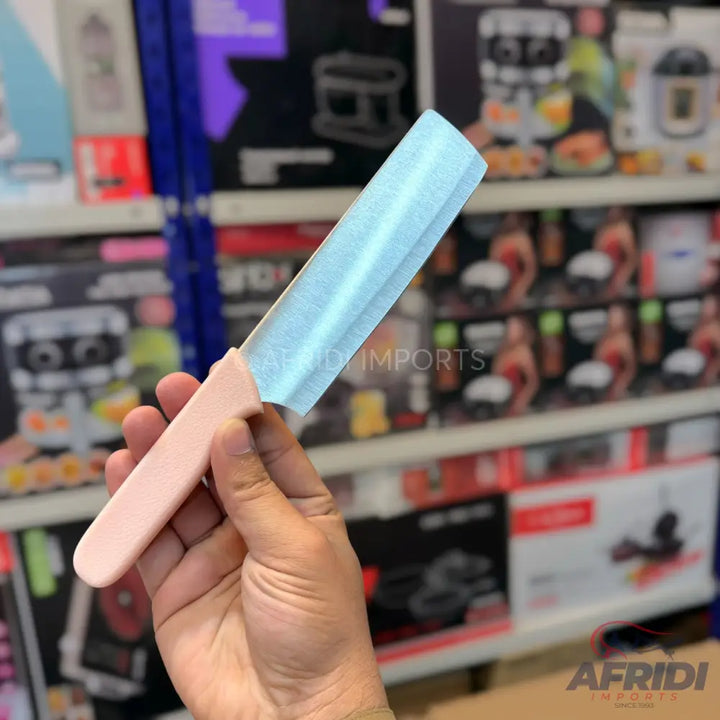 A knife with a light pink handle and a light blue blade.