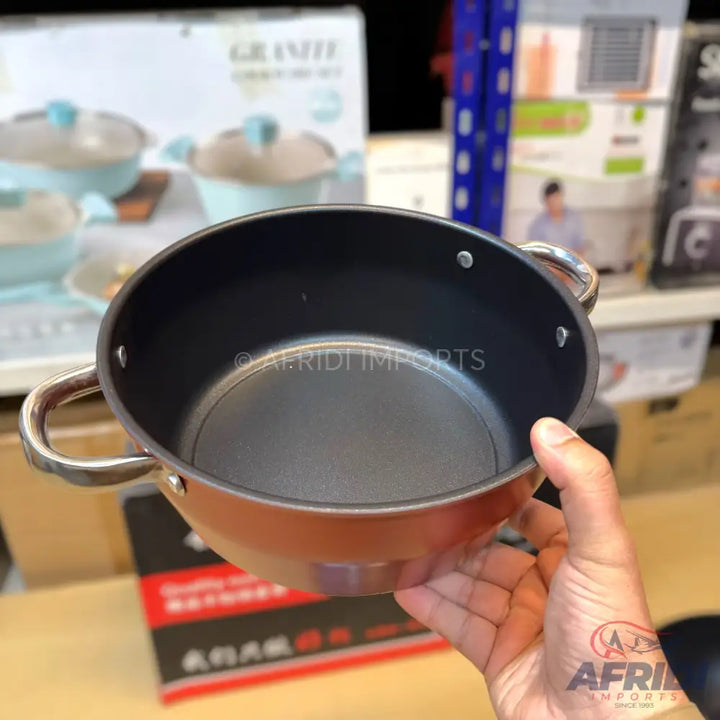 Single red non-stick cooking pot with two silver handles.