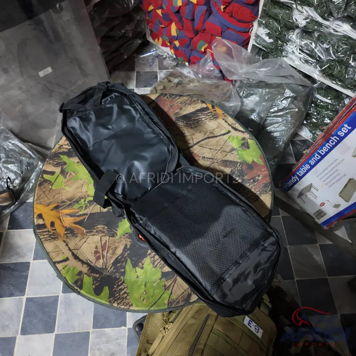 Black rectangular soft case with an open main compartment.