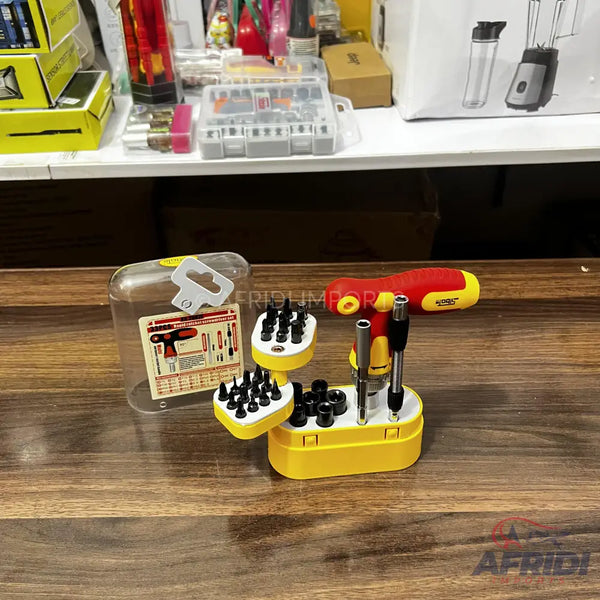 A yellow and red screwdriver set with multiple interchangeable bits in a storage case.