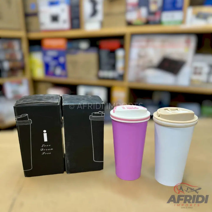 Reusable travel mugs with two in packaging.