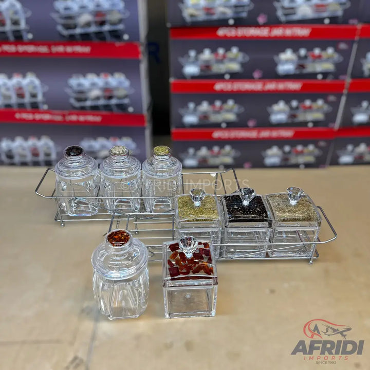 Clear acrylic spice jar sets with chrome stands.