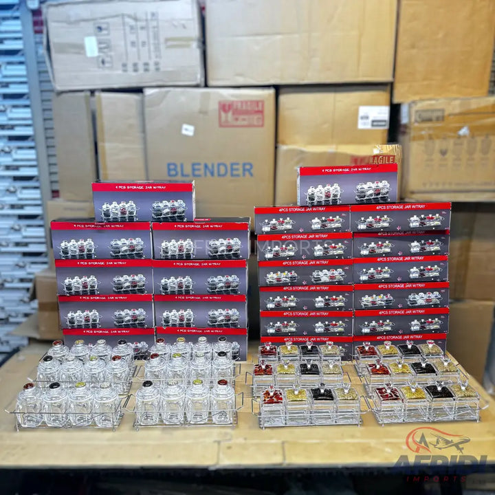 Sets of clear glass storage jars with various colored lids on metal racks.