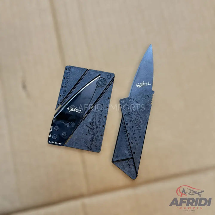 Credit card-sized folding utility knife.