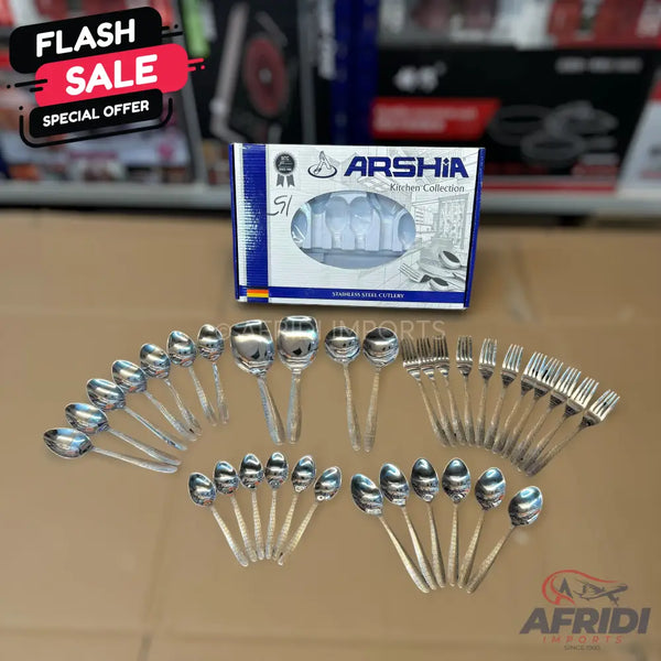 A boxed set of stainless steel cutlery, including various spoons and forks.