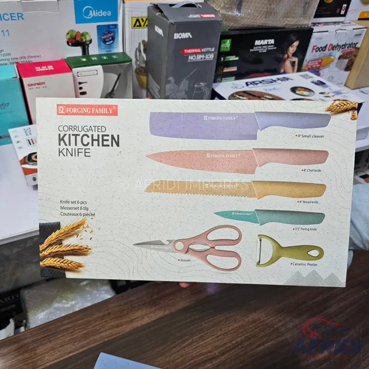 A 6-piece kitchen knife set with a peeler and scissors.