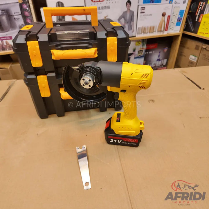 Cordless yellow and black angle grinder with a removable battery.