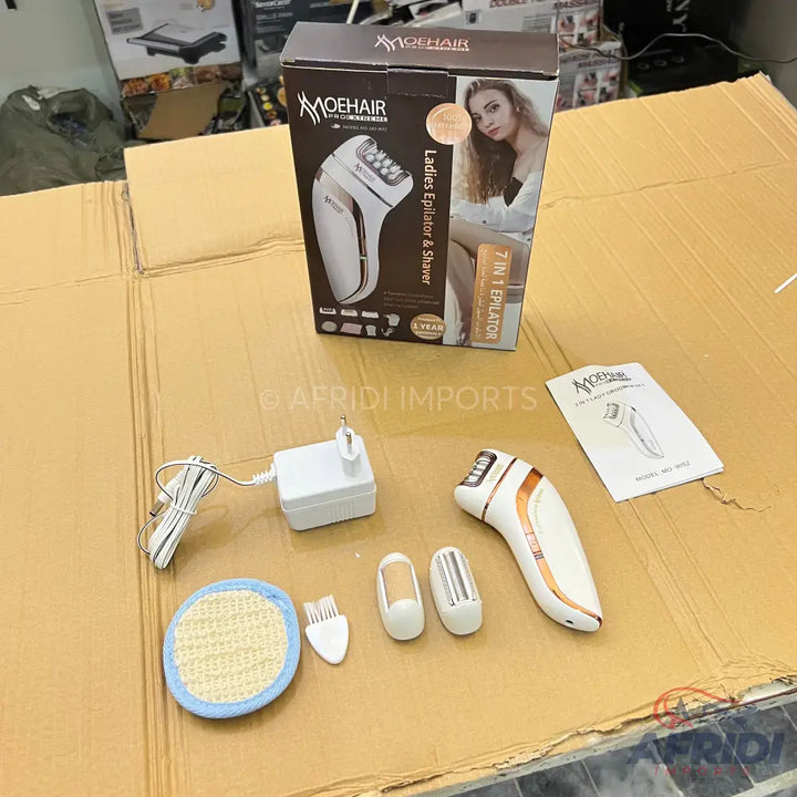 A ’MOEHAIR’ 7-in-1 epilator and shaver for ladies, complete with charging adapter, interchangeable heads, cleaning brush, and instruction manual.