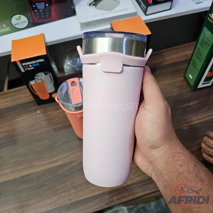 Pink stainless steel hot and cold travel mug.