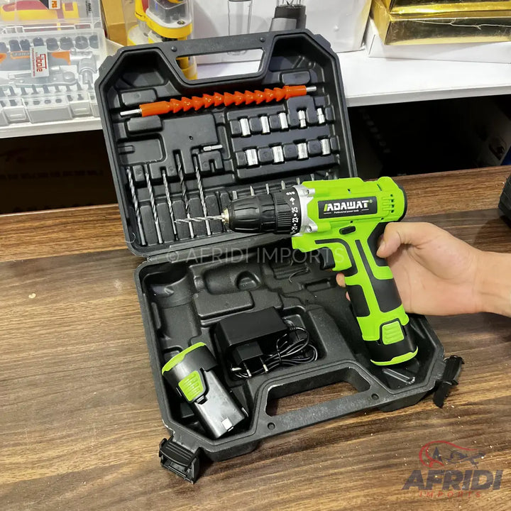 Green and black cordless drill kit with various bits, a charger, and an extra battery in a hard case.