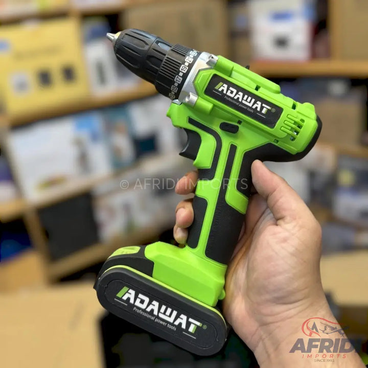 A vibrant green and black cordless power drill.