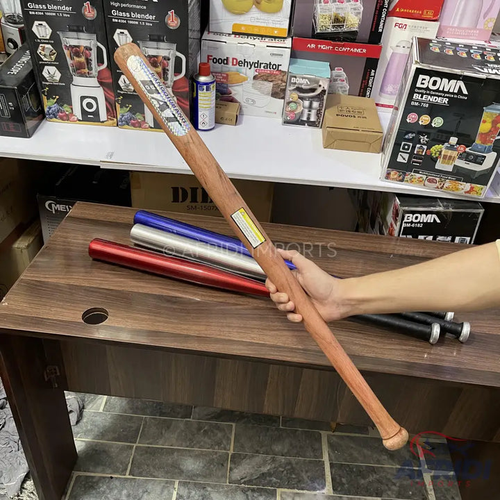 Wooden baseball bat with a yellow label.