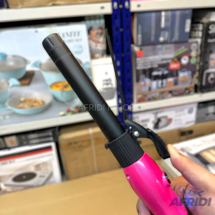 Pink and black ceramic hair curling iron.