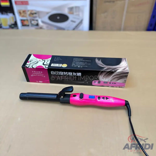 Pink and black automatic rotating hair curler.