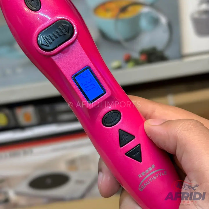 Pink hair styling tool with a digital display and control buttons.