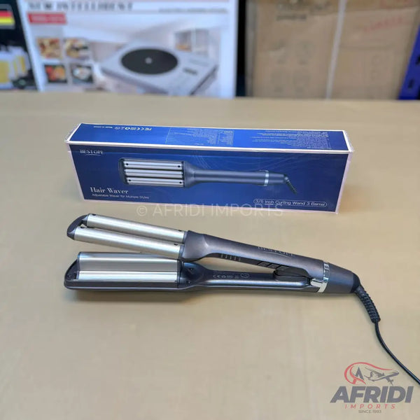 A three-barrel hair waver for creating crimped or wavy hairstyles.