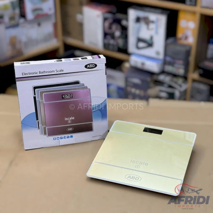 An electronic bathroom scale with its packaging.