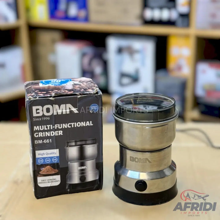 Stainless steel multi-functional grinder with a clear top.