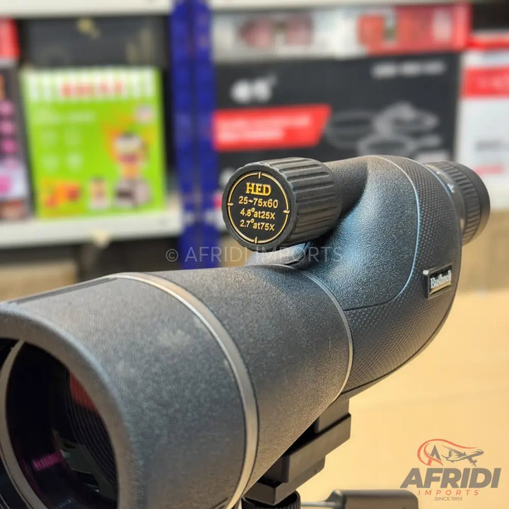 Black spotting scope with a textured finish and silver accents.
