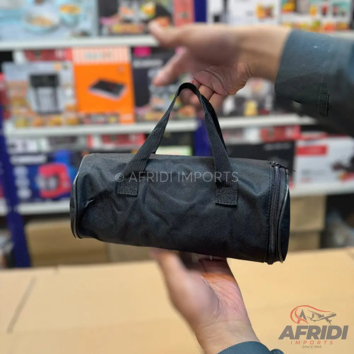 Black cylindrical duffel bag with two top handles and a zipper closure.