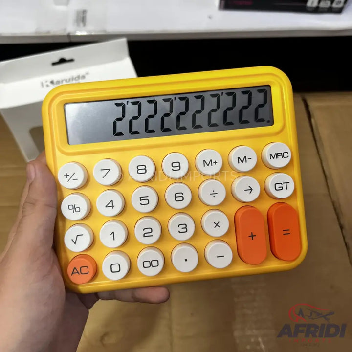 Yellow desktop calculator with white and orange buttons.