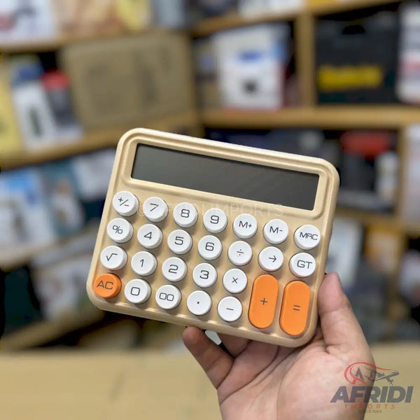 A beige and white calculator with orange accent buttons.