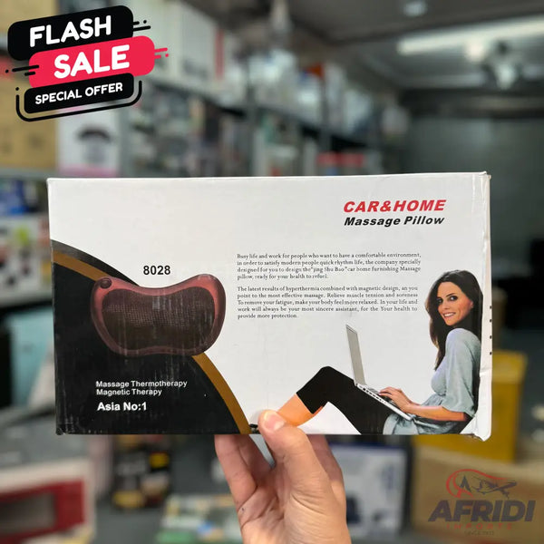 A white box for a ’CAR&HOME Massage Pillow’ featuring a woman using a laptop and a close-up of the pillow itself.