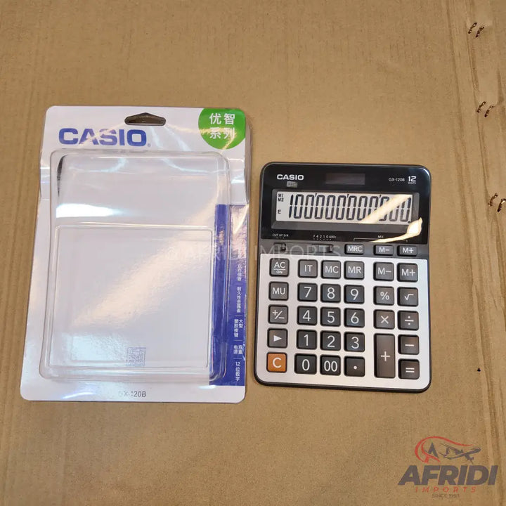 A packaged Casio calculator alongside an unpacked Casio calculator.
