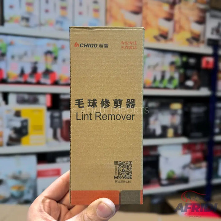 Brown cardboard box for a lint remover