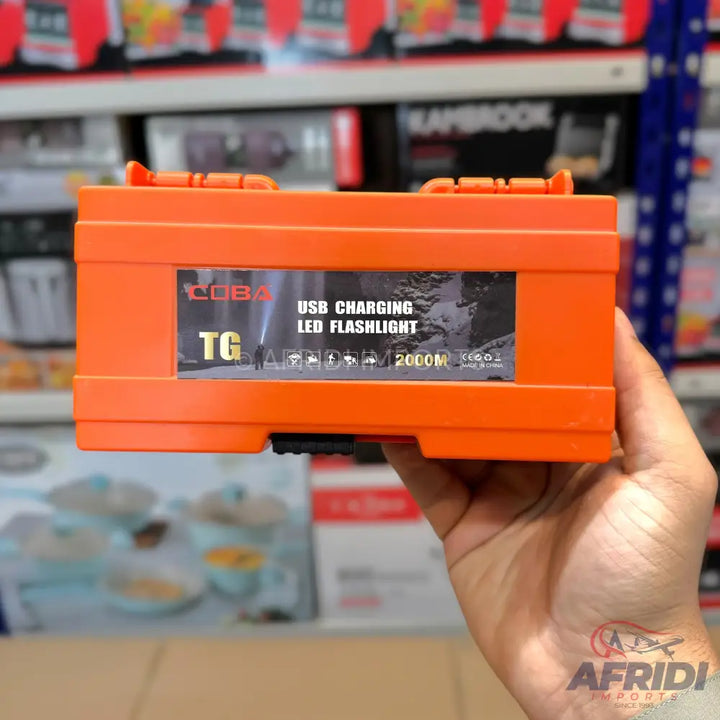 Orange rectangular USB charging LED flashlight.