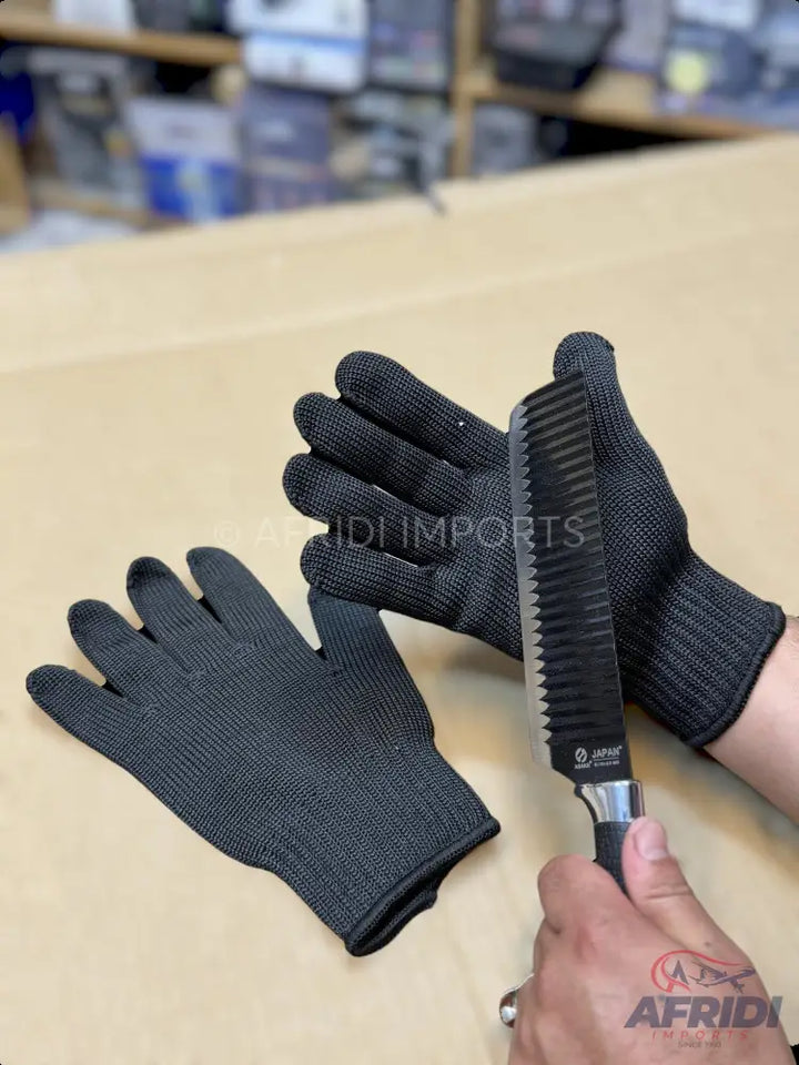 A pair of black, cut-resistant gloves and a serrated knife.