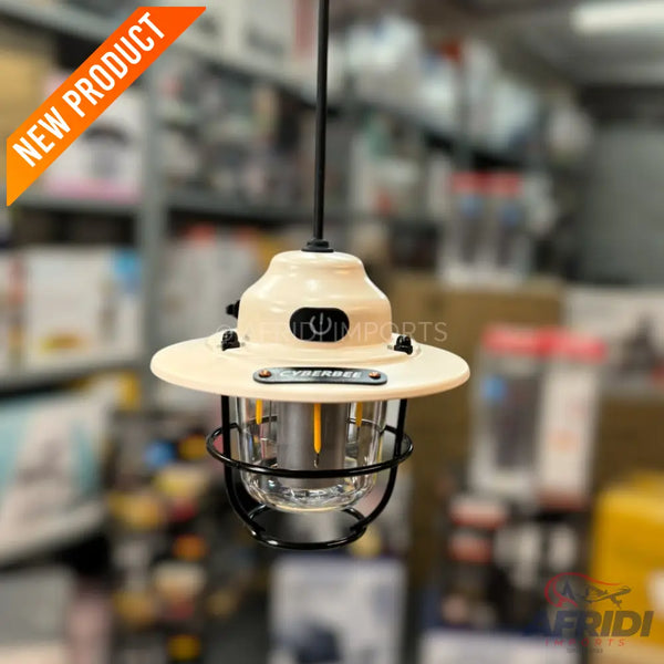 Cream-colored hanging lantern with a black metal cage and a clear glass enclosure.