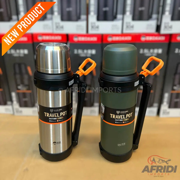 Two insulated travel pots, one silver and one green, each with an orange handle.