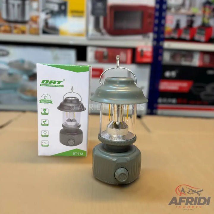 A portable camping lantern with a classic design.