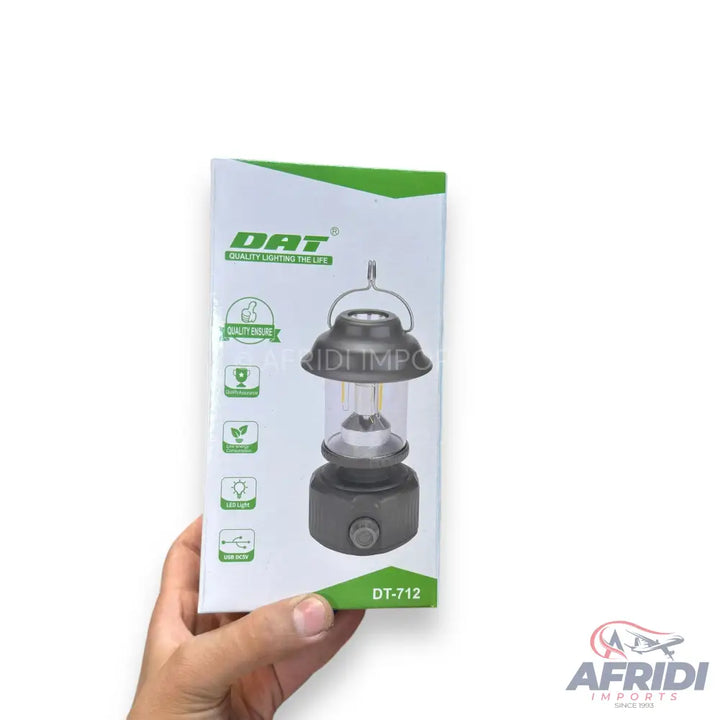 A boxed portable LED camping lantern with a classic design.
