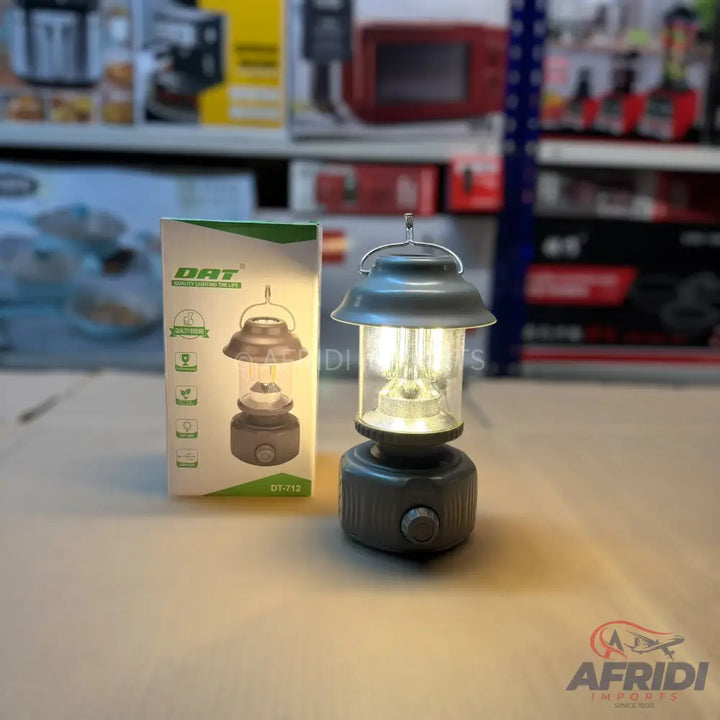 An antique-style battery-powered LED camping lantern with a dimmer switch.