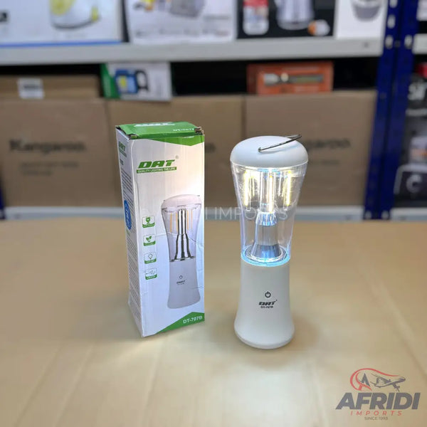 White portable electric lantern with a light-up clear top.