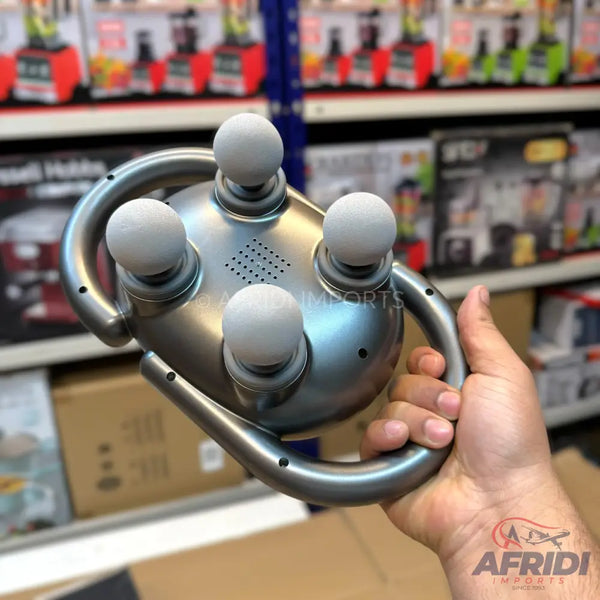 A handheld, gray, metallic-looking massager with five white spherical massage nodes and a speaker grille.