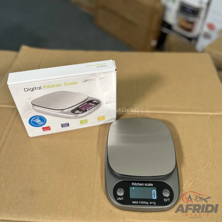 Silver and gray digital kitchen scale with a display and buttons.