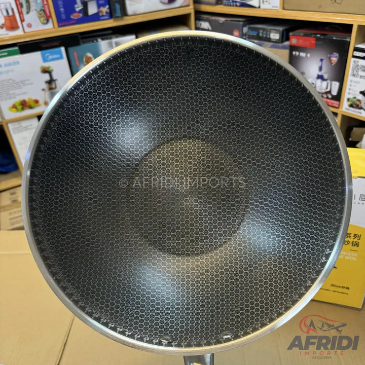 Black hexagonal patterned non-stick frying pan.