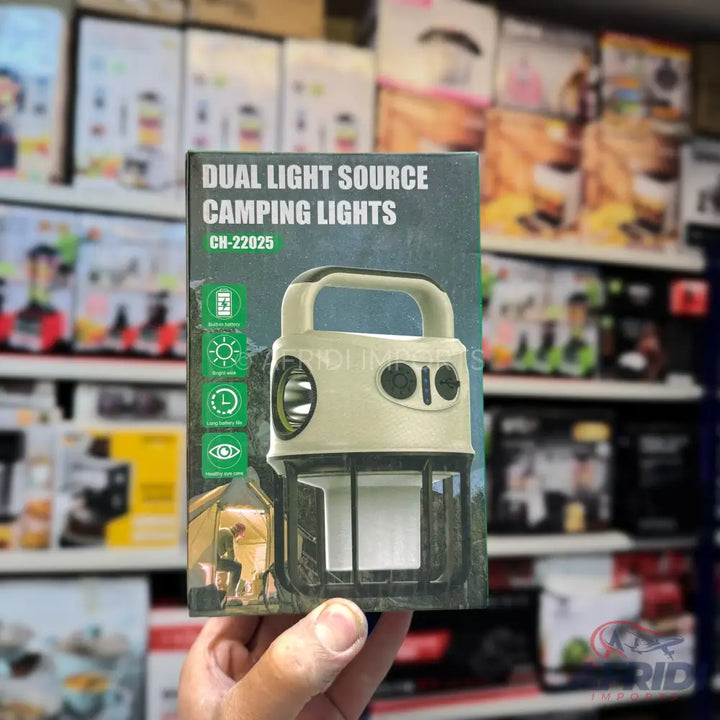A dual light source camping lantern with a flashlight and an area light, featuring a handle for portability.