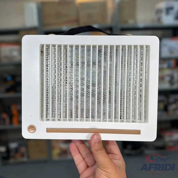 White portable electric mosquito killer with a copper-colored power button and handle.