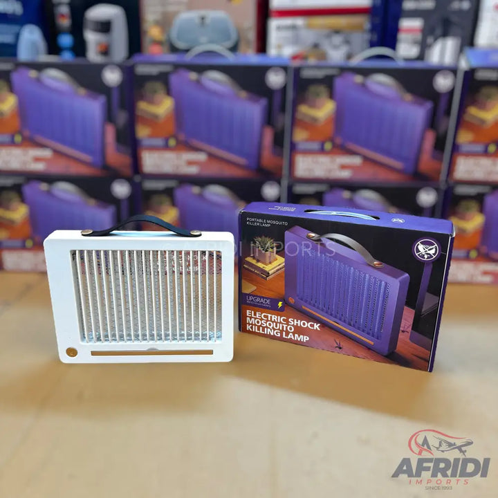 White electric mosquito killing lamp with a black handle.