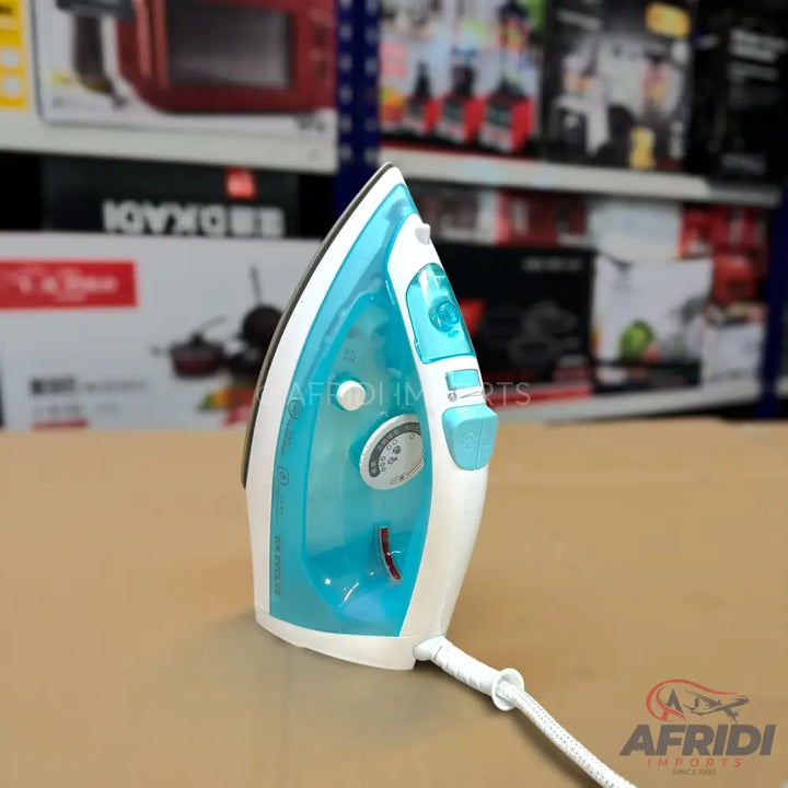 A white and light blue steam iron with a water reservoir and temperature dial.