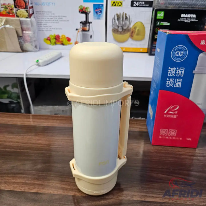 Cream-colored insulated beverage bottle with a handle.
