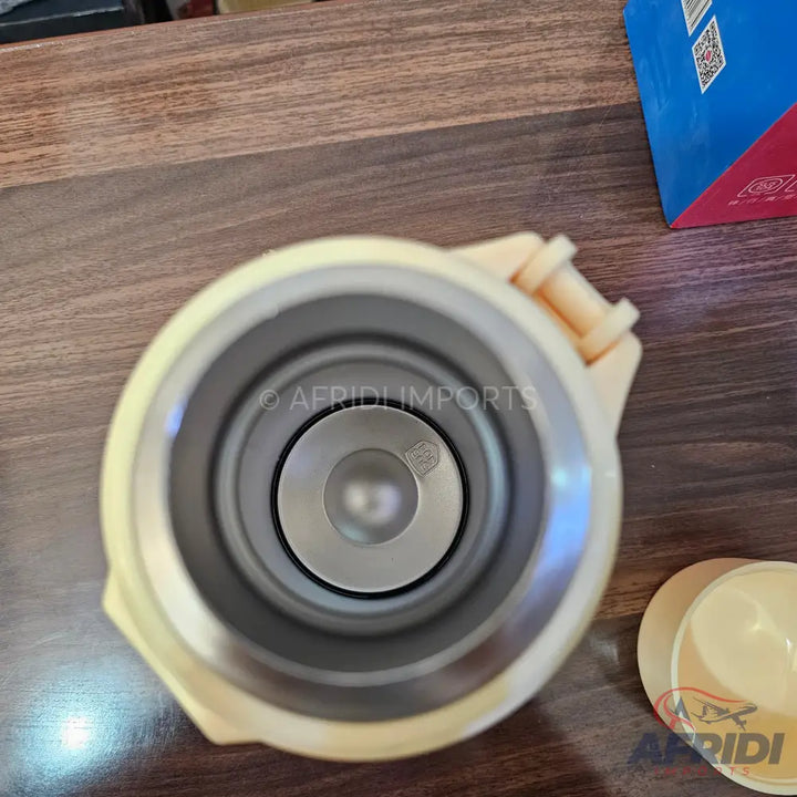 Cream-colored thermos with a metal interior and removable cap.
